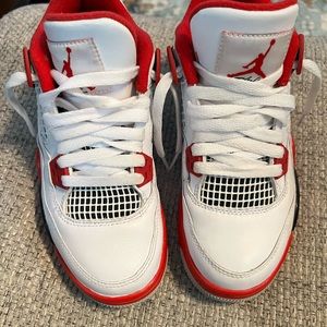 Pre-owned Jordan Retro size Y4. Only worn a couple times. Excellent condition.